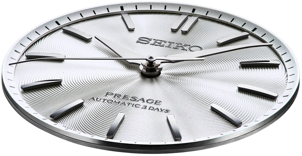 Photo of A dial reflecting the graceful drape and texture of finely woven silk